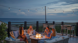 Group of people at The Rooftop at Henderson Beach Resort